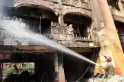 Delhi MP's Housing Complex Engulfed in Flames: Brave Firefighter Rescues Trapped Pet in Dramatic Operation