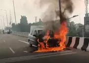 Family's Narrow Escape as Car Catches Fire on Phagwara Flyover