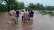 Gujarat Battles Torrential Rains: 60 Rescued as CM Deploys Ministers to Flood-Hit Areas