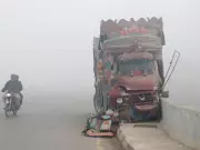 Karachi's Road Crisis: Residents Battle Potholes, Lawlessness