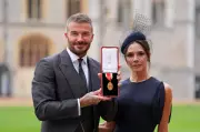 King Charles III Confers Knighthood Upon Football Legend David Beckham in Regal Ceremony