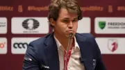 Magnus Carlsen Tapes Over Betting Sponsor Logo at FIDE World Rapid Chess in Doha