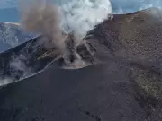Mount Etna Erupts: Ash Clouds & Sporadic Explosions Grip Sicily