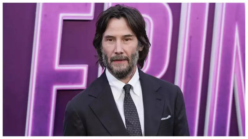 Shocking Video: Keanu Reeves' Overzealous Fan Attempts to Enter His Car, Claims to Be His 'Divine Wife'