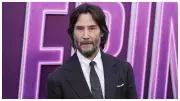Shocking Video: Keanu Reeves' Overzealous Fan Attempts to Enter His Car, Claims to Be His 'Divine Wife'