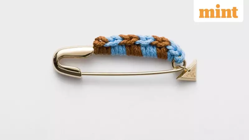 Prada's ₹5.7 Lakh Safety Pin Sparks Internet Frenzy: Are Luxury Brands Mocking Consumers?