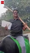 Bihar Candidate Kedar Prasad Yadav Rides Buffalo to Vote in Vaishali