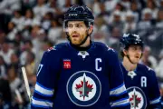 Will Adam Lowry Stay in Winnipeg? Jets Captain's Contract Saga Heats Up!