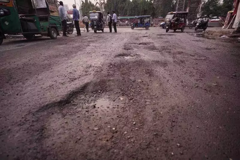 GMDA CEO PC Meena's 15-Day Pothole Fix & 3-Year Road Plan for Gurgaon
