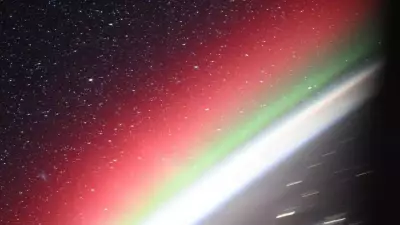 NASA Astronaut's Rare Photo Captures Earth's Aurora, City Lights & Andromeda Galaxy