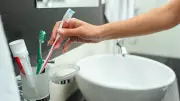 Stop Storing Your Toothbrush in the Bathroom! 4 Healthier Spots Dentists Recommend
