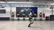 Tesla's Optimus Robot 'Complains' About No Badge, Highlights China's Lead in Humanoid Race
