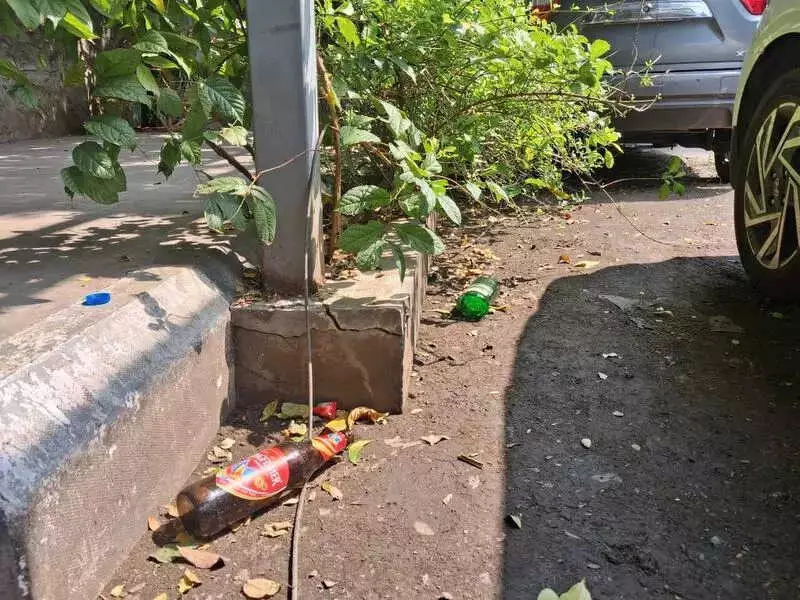 Kotturpuram's Green Pathway Now a Nightmare: 800m of Debris & Liquor Bottles
