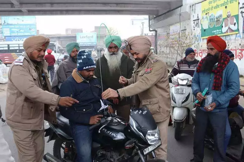 Ludhiana Police Distributes Iron Shields to Protect Riders from Banned Kite Strings