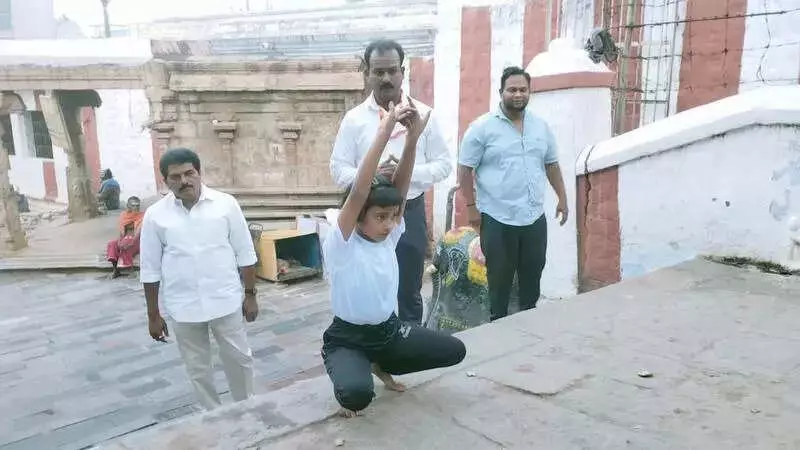 Salem Girl Climbs 1,300 Temple Steps with Yoga Asanas to Promote Practice
