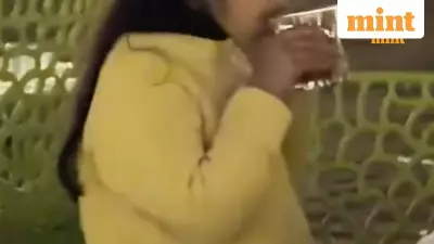 Viral Video of Child Sipping Drink Sparks Online Debate on Parenting