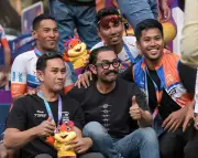 Aamir Khan Cheers Cyclists at Pune Grand Tour, Channels Iconic Movie Role
