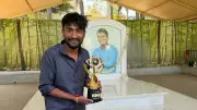 Gilli Nata Dedicates Bigg Boss Trophy to Puneeth Rajkumar in Heartfelt Gesture
