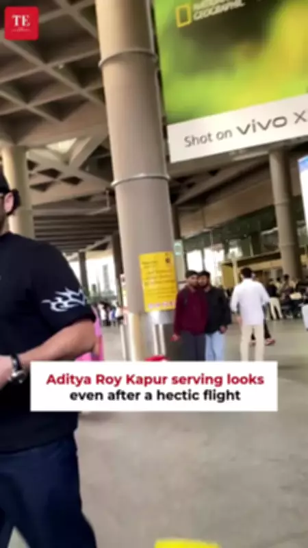 Aditya Roy Kapur Returns to Mumbai, Charms Paparazzi with Signature Smile