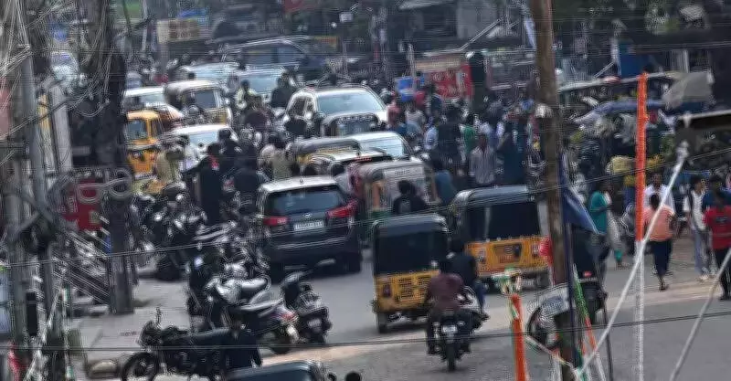 Hyderabad's Ayyappa Society Road Choked by Hawkers, Parking, and Stray Cattle