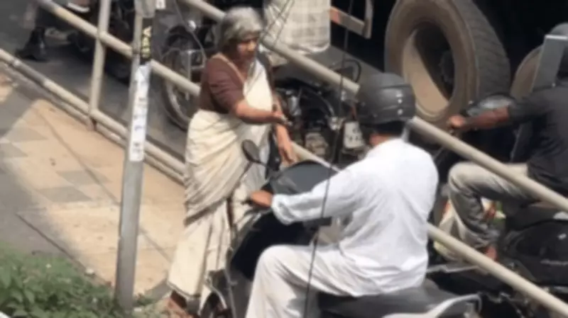 Kerala Elderly Woman's Viral Stand Against Scooter on Footpath Wins Praise