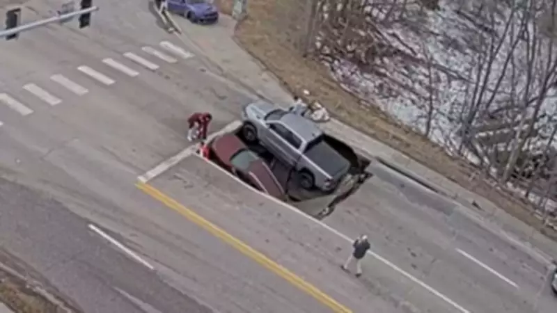 Massive Sinkhole Swallows Two Vehicles Near University of Nebraska Omaha