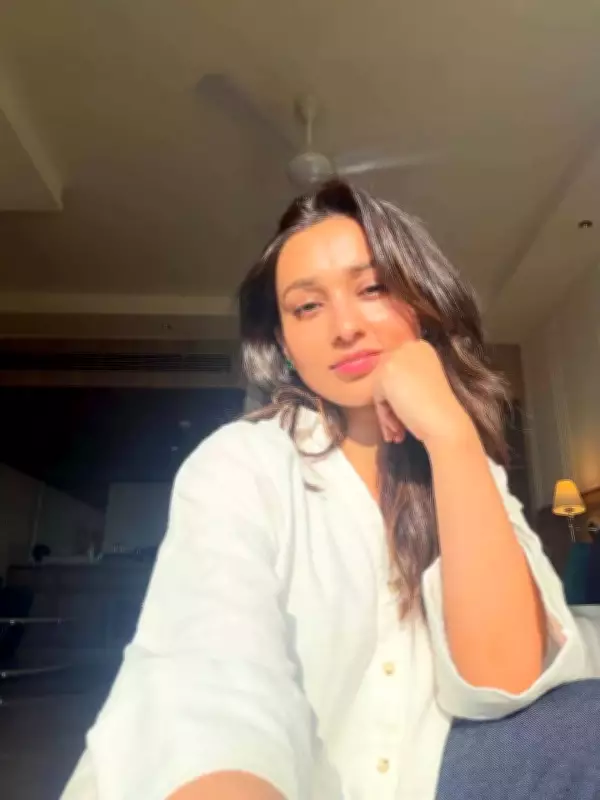 Mimi Chakraborty's Sunlit Portraits Showcase Serene Side in Simple White Shirt