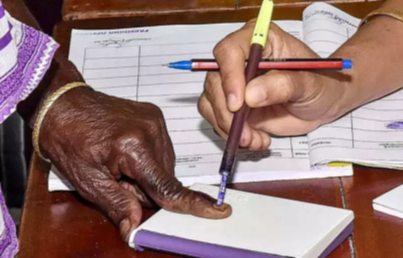 MLA Sparks Controversy by Taking Son Inside Polling Booth During Zilla Parishad Elections