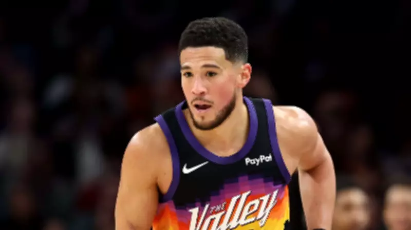Phoenix Suns' Devin Booker Sidelined for Month with Hip Injury, Team Faces Roster Challenges