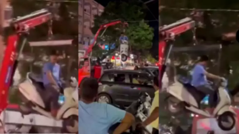 Pune Man's Viral Scooter Standoff: Crane Lifts Him Mid-Air During Tow
