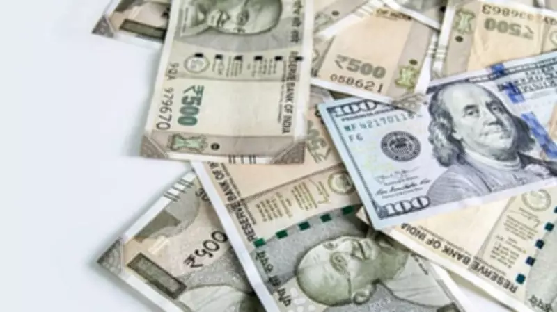 Rupee Declines 8 Paise, Settles at 90.99 Against US Dollar
