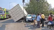 Empty Shipping Container Detaches from Truck, Crashes onto Car in Trichy