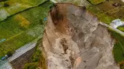 Massive Sinkhole in Indonesia's Aceh Expands, Threatening Farmland and Homes
