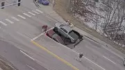 Massive Sinkhole Swallows Two Vehicles Near University of Nebraska Omaha