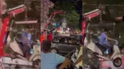 Pune Man's Viral Scooter Standoff: Crane Lifts Him Mid-Air During Tow