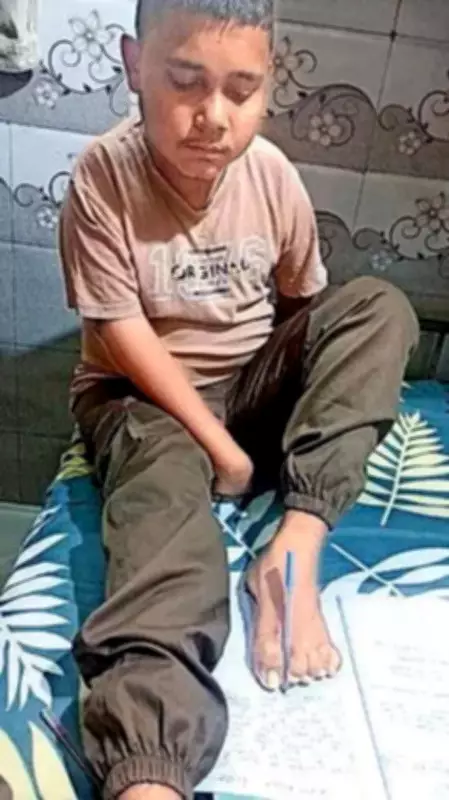 Ahmedabad Student Writes Board Exams with Feet, DEO Pledges Full Educational Support