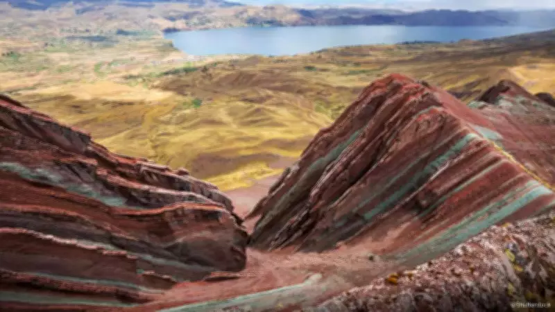 Discover Pallay Punchu: Peru's Sacred Multi-Colored Mountain Gem