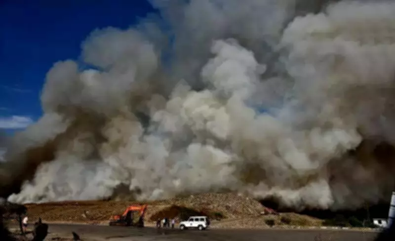 Massive Fire Engulfs Surat's Khajod Waste Site, Smoke Visible for Kilometers