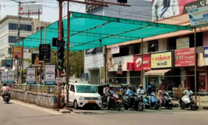 Trichy Police Install Green Sunshade Nets at Traffic Signals to Combat Rising Heat
