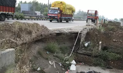 Potholed Service Lanes and Worn Edges on Amritsar Bypass Highway Pose Grave Driving Hazards