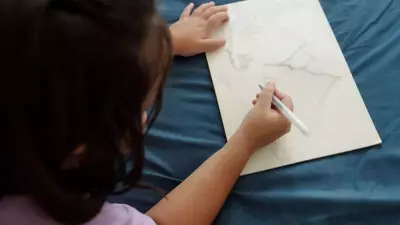 Viral Child's Drawing of Smiling Falling Dad Sparks Internet Debate on Children's Art