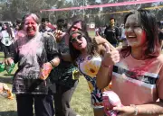 Delhi's Vibrant Holi Celebration Unites Diverse Communities Away from Home