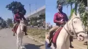 Dewas Bank Agent Rides Horse to Work Amid Fuel Crisis, Video Goes Viral