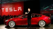 Tesla Defies AI Layoff Trend: Musk Promises Job Growth Amid Industry Cuts