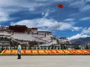 Tibetan Parliament in Exile Standardizes National Flag, Condemns China's Ethnic Law