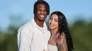 Travis Hunter's Relaxed Offseason Post Sparks Buzz with Wife's Flirty Comment