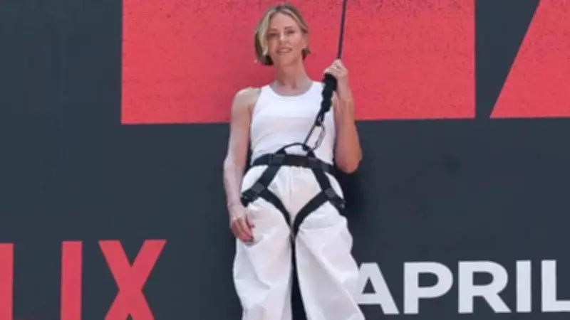 Charlize Theron Scales Times Square Billboard to Promote New Film Apex