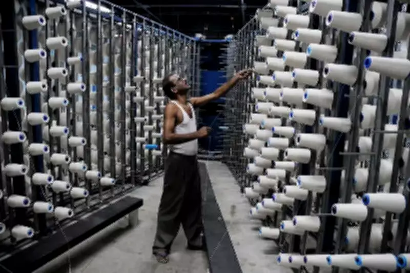 Gujarat's Renewable Power Curtailment Cripples Textile Spinning Industry