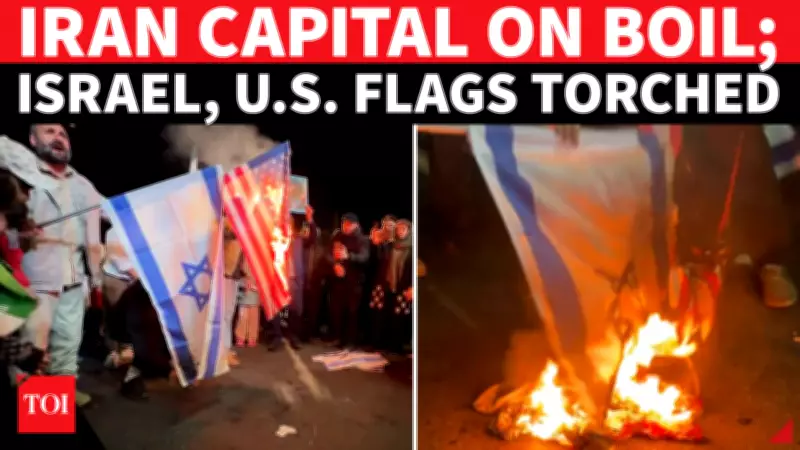 Iranian Protesters Burn US, Israel Flags in Tehran, Reject Ceasefire as 'War Not Over'