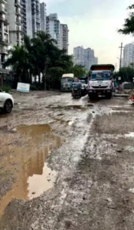 Noida Residents Demand Road Repairs After School Bus Gets Stuck in Pothole